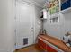 Charming mudroom with custom bench seating, storage, and a window for natural light at 2309 Yancey St, Raleigh, NC 27608