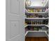 Walk-in pantry with abundant shelving, providing ample storage space for food and household items at 2309 Yancey St, Raleigh, NC 27608