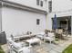 Outdoor patio with stone flooring and a spacious seating area, perfect for entertaining at 2309 Yancey St, Raleigh, NC 27608