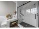Elegant glass-enclosed shower with subway tile and modern vanity at 2309 Yancey St, Raleigh, NC 27608