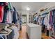 Spacious walk-in closet with center island for additional storage and organization at 2309 Yancey St, Raleigh, NC 27608