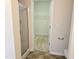 Bathroom showing a glass door shower and a walk-in closet at 2330 Lazy River Dr, Raleigh, NC 27610