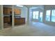 Open-concept living area with large windows offering ample natural light at 2330 Lazy River Dr, Raleigh, NC 27610