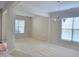 Bright living room with neutral carpet, an open floor plan, and natural light at 2330 Lazy River Dr, Raleigh, NC 27610