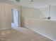 Cozy loft area with neutral walls, carpet flooring and a ceiling fan at 2330 Lazy River Dr, Raleigh, NC 27610