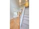 Open foyer featuring staircase with neutral carpet and hardwood floor entry at 2441 Deanwood Dr, Raleigh, NC 27615