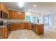 Well-equipped kitchen with stainless steel appliances, granite countertops and tile flooring at 2441 Deanwood Dr, Raleigh, NC 27615