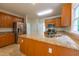 Modern kitchen with granite countertops, stainless steel appliances, and ample cabinet space at 2441 Deanwood Dr, Raleigh, NC 27615