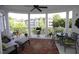 Inviting outdoor patio featuring elegant columns, comfortable seating, and scenic neighborhood views at 2901 Market Bridge Ln # 203, Raleigh, NC 27608