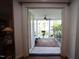 View of the inviting patio area from inside the home, highlighting indoor-outdoor flow at 2901 Market Bridge Ln # 203, Raleigh, NC 27608
