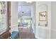 Bright foyer featuring hardwood floors, high ceilings, and an open view to the living area at 2916 Reynolda Cir, Durham, NC 27712