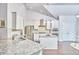 A modern kitchen featuring stainless steel appliances, granite countertops, and custom cabinetry at 2916 Reynolda Cir, Durham, NC 27712