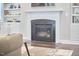 Cozy living room with fireplace and built-in shelving for storage and decor at 2916 Reynolda Cir, Durham, NC 27712