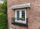 Close up view of the balcony and brick exterior at 2921 Imperial Oaks Dr, Raleigh, NC 27614