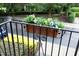 A close-up of a balcony featuring colorful flower boxes at 2921 Imperial Oaks Dr, Raleigh, NC 27614