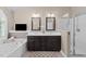 Bathroom features double sinks, tiled floor, shower, jacuzzi tub and tv at 2921 Imperial Oaks Dr, Raleigh, NC 27614