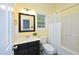 Bathroom with a single sink vanity, a shower with a curtain and neutral color walls at 2921 Imperial Oaks Dr, Raleigh, NC 27614