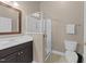 Bathroom featuring a walk-in shower, vanity with sink, and tile flooring at 2921 Imperial Oaks Dr, Raleigh, NC 27614