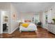A charming bedroom with hardwood floors, artwork, and an abundance of light at 2921 Imperial Oaks Dr, Raleigh, NC 27614
