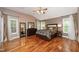 Spacious main bedroom boasts gleaming hardwood floors, neutral paint and vaulted ceiling at 2921 Imperial Oaks Dr, Raleigh, NC 27614