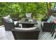Outdoor deck features comfortable seating and views of the lush green backyard at 2921 Imperial Oaks Dr, Raleigh, NC 27614