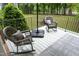 Outdoor deck features rocking chairs and an umbrella perfect for relaxing at 2921 Imperial Oaks Dr, Raleigh, NC 27614