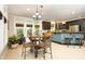 Bright breakfast nook off the kitchen features a table, chairs and lots of natural light at 2921 Imperial Oaks Dr, Raleigh, NC 27614