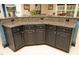 Kitchen island features stylish cabinetry, granite countertops, and convenient outlets for appliances at 2921 Imperial Oaks Dr, Raleigh, NC 27614