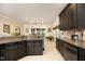 Bright kitchen showcases granite countertops, stainless steel appliances, and sunlit dining area at 2921 Imperial Oaks Dr, Raleigh, NC 27614