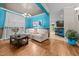 Inviting living area with stylish decor, hardwood floors, and adjacent kitchen with breakfast bar at 2921 Imperial Oaks Dr, Raleigh, NC 27614