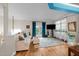 Comfortable living room with hardwood floors, a ceiling fan, and access to a balcony at 2921 Imperial Oaks Dr, Raleigh, NC 27614