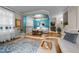 Open-concept living room with a cozy seating area, hardwood floors, and stylish decor, creating a comfortable and inviting space at 2921 Imperial Oaks Dr, Raleigh, NC 27614