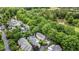 Scenic aerial view of the neighborhood surrounded by lush greenery and a calm pond at 3 Yancey, Pittsboro, NC 27312