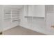 Custom closet offers ample storage space with built-in shelving and chrome rods at 3 Yancey, Pittsboro, NC 27312