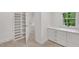 Walk-in closet featuring built-in shelving and drawers for optimal organization at 3 Yancey, Pittsboro, NC 27312