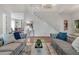 Inviting living room featuring high ceilings, elegant furnishings, and hardwood floors at 3 Yancey, Pittsboro, NC 27312