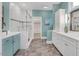 Main bathroom featuring double vanity, tiled floor, and walk-in shower with glass door at 3 Yancey, Pittsboro, NC 27312