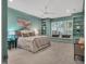 Spacious main bedroom features built-in shelving, window seat, and ceiling fan at 3 Yancey, Pittsboro, NC 27312
