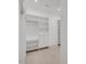 Walk-in closet with carpet and custom shelves and clothing racks at 3 Yancey, Pittsboro, NC 27312