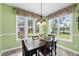 Cozy dining area features large windows offering natural light and pleasant outdoor views at 30 Cornerstone Dr, Franklinton, NC 27525