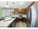 Modern kitchen features stainless steel appliances, sleek countertops, and plenty of cabinet space at 30 Cornerstone Dr, Franklinton, NC 27525