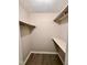 Walk-in closet with ample storage space and vinyl floors at 3047 Huntleigh Dr, Raleigh, NC 27604