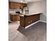 Kitchen featuring updated cabinets, stainless steel appliances, granite countertops, and new floors at 3047 Huntleigh Dr, Raleigh, NC 27604