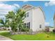 Charming home with lush green yard, brick accents, and a well-manicured garden bed at 316 Wellwater Ave, Durham, NC 27703