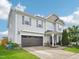 Beautiful two-story home with a two-car garage, lovely landscaping, and a welcoming front porch at 316 Wellwater Ave, Durham, NC 27703