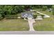 Expansive aerial view of home showcasing large lot, swimming pool, long driveway and backyard at 3216 Nc Hwy 42, Willow Springs, NC 27592