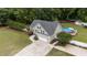 Aerial view of the home and fenced yard with pool in rear at 3216 Nc Hwy 42, Willow Springs, NC 27592