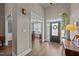 Well-lit foyer featuring hardwood floors, high ceilings, and attractive front door at 3216 Nc Hwy 42, Willow Springs, NC 27592
