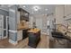 Gourmet kitchen with granite countertops, modern appliances, hardwood floors, and ample cabinet space at 3216 Nc Hwy 42, Willow Springs, NC 27592