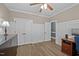 This home office has wainscotting, laminate wood flooring and an adjacent room at 3216 Nc Hwy 42, Willow Springs, NC 27592